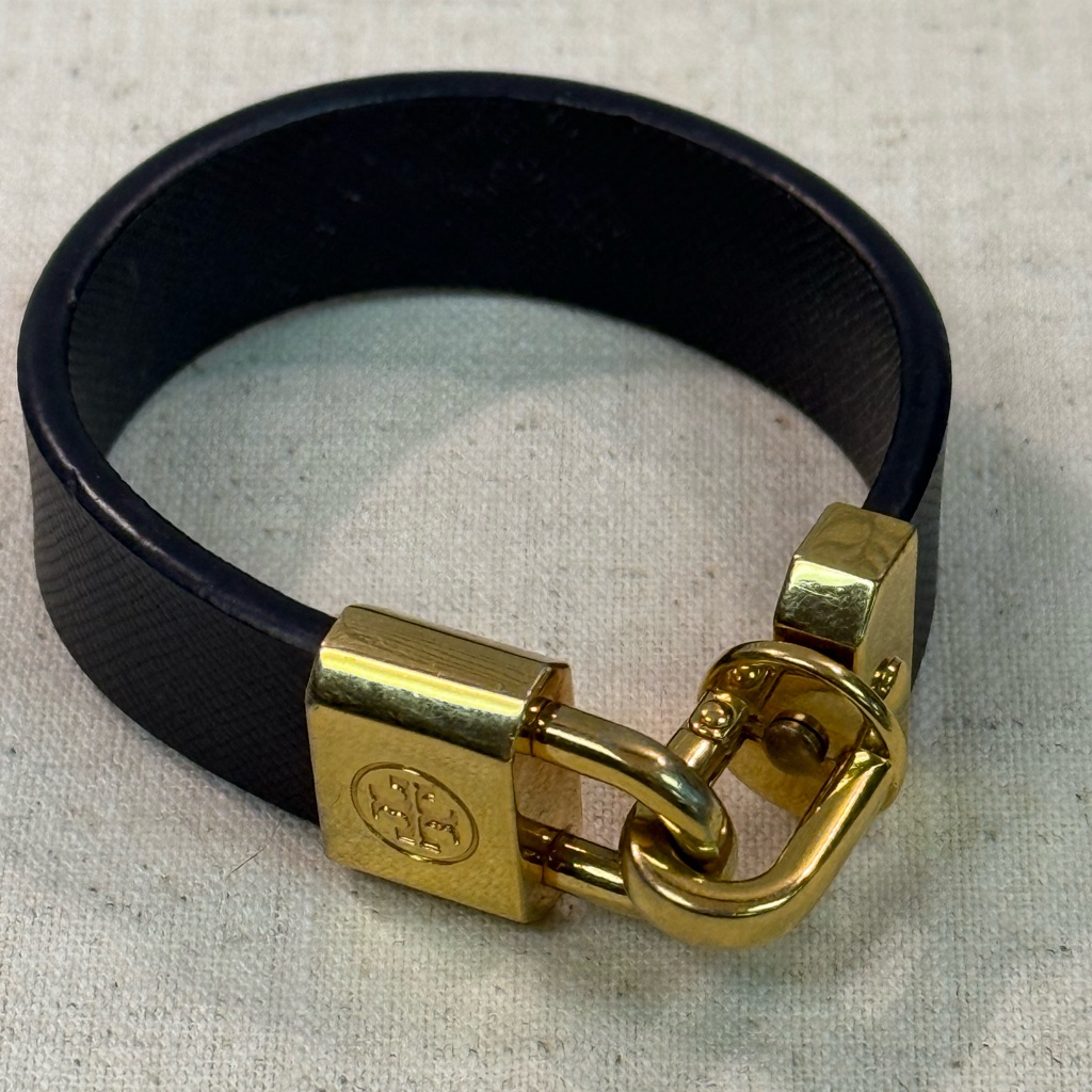 Gold-Tone Lock Bracelet With Black Leather Band